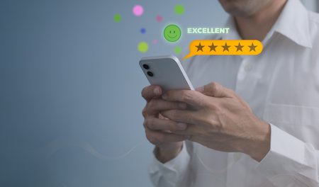 Customer service and Satisfaction concept ,Business people are touching the virtual screen on the happy Smiley face icon to give satisfaction in service. rating very impressed.の写真素材