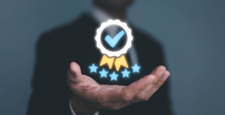 Businessman Hand shows the sign of the top service the best Quality assurance, Guarantee, Standards, ISO certification and standardization concept. guarantee product and ISO service concept.の写真素材