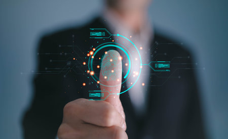 futuristic digital processing of biometric identification fingerprint scanner. concept of surveillance and security scanning of digital programs cyber futuristic applicationsの写真素材