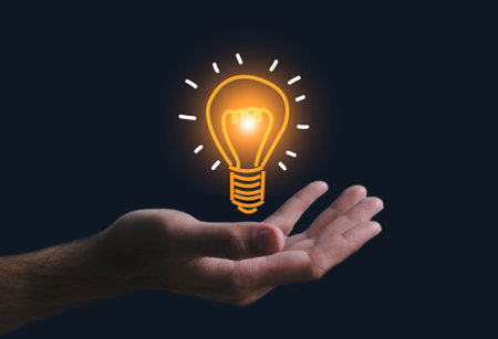Innovation. Hands holding light bulb for Concept new idea concept with innovation and inspiration, innovative technology in science and communication concept,.の写真素材