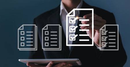 Electronic smart checklist and document on virtual screens concept, business people check electronic documents on digital documents, paperless offices,working on borderless communication technologyの写真素材