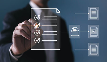Electronic smart checklist and document on virtual screens concept, business people check electronic documents on digital documents, paperless offices,working on borderless communication technologyの写真素材