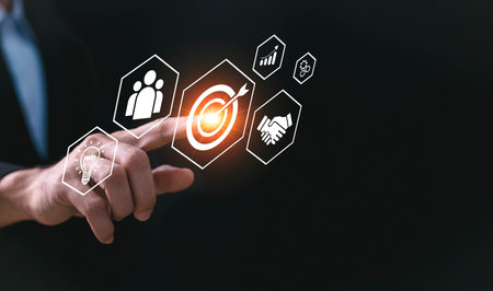 planning development leadership and customer target group concept.businees man touch target icon which for planning development leadership and customer target.の写真素材
