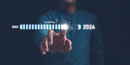 Businessman touch on loading progress from 2023 to 2024,Planning and challenge strategy in new year...