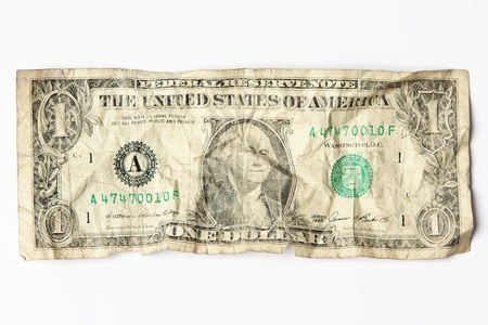 Old crumpled one dollar billの写真素材