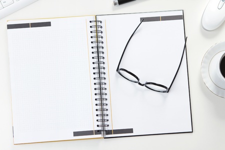 Blank note at the office deskの写真素材