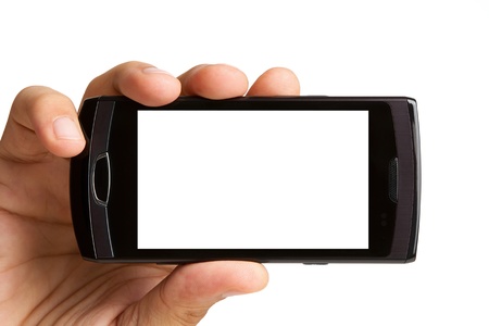 Hand holding blank mobile phone, clipping path for the screen includedの写真素材