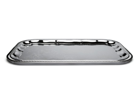 Empty silver tray isolated on whiteの写真素材