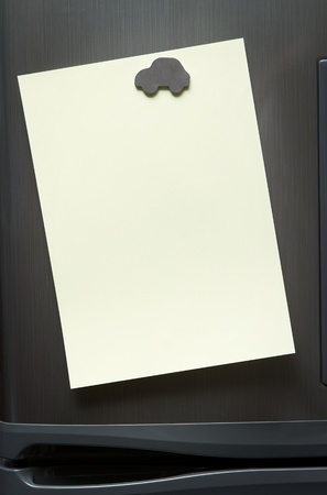 Blank note at the refrigerator with copy spaceの写真素材