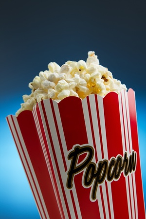 Popcorn over blue backgroundの写真素材