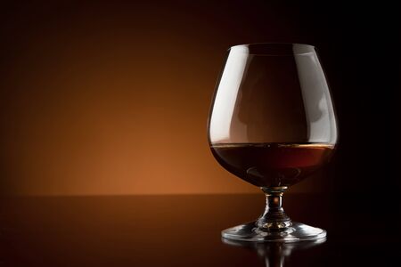 Glass of luxury cognac with copy spaceの写真素材