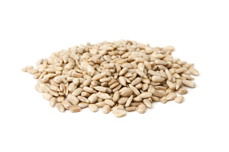 Sunflower seeds isolated on whiteの写真素材