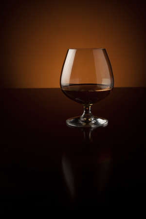 Glass of cognac with copy spaceの写真素材