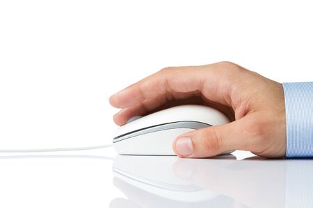 Male hand holding computer mouse isolated on whiteの写真素材