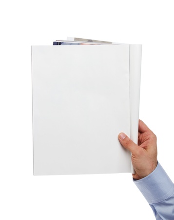 Human hand holding blank magazine with copy spaceの写真素材