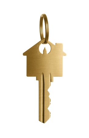 Gold house shaped key isolated on white backgroundの写真素材