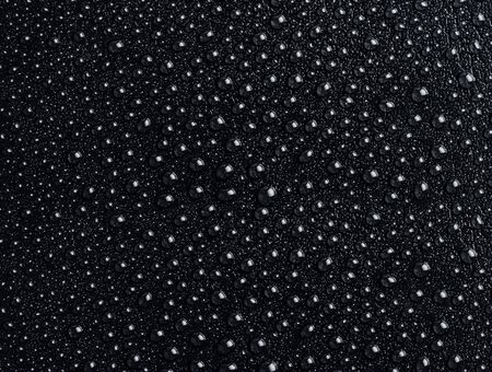 Water drops on black background