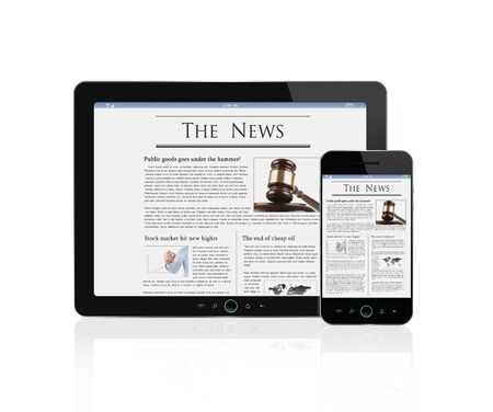 Latest news at digital tablet and smart phone isolated on white backgroundの写真素材