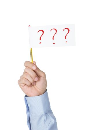 Office worker holding with white paper flag with question marksの写真素材