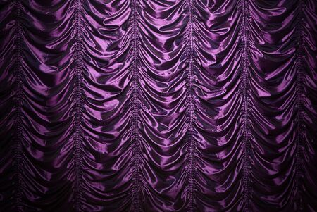 Purple waved silk curtain background with copy spaceの写真素材