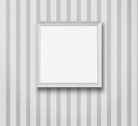 Blank picture frame at the striped wallpaper with copy space and clipping pathの写真素材