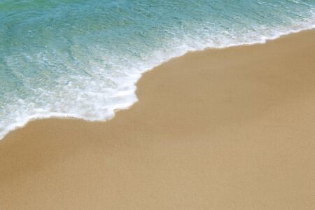 Vacations background, ocean wave on the beach with copy spaceの写真素材