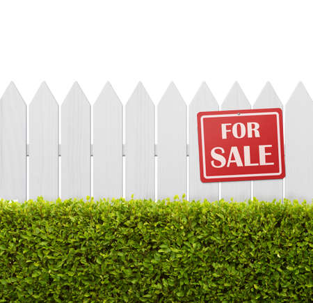 For sale sign on white wooden fence isolated on white background with copy spaceの写真素材