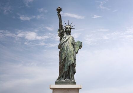 Statue of liberty over sky background with copy spaceの写真素材