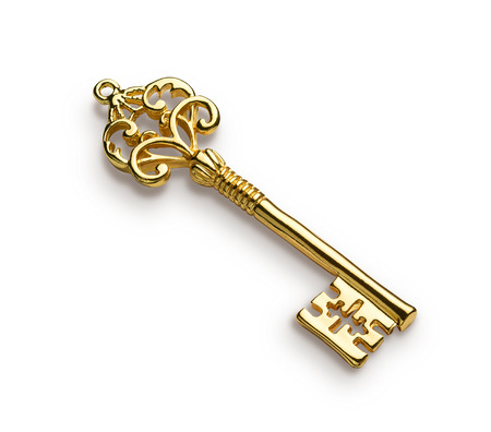 Gold skeleton key isolated on white backgroundの写真素材