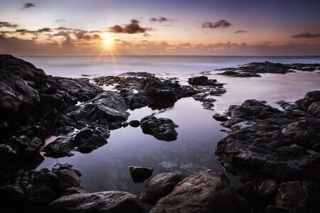 Calm sunset over the Atlantic Ocean, Lanzarote, Playa Blancaの写真素材