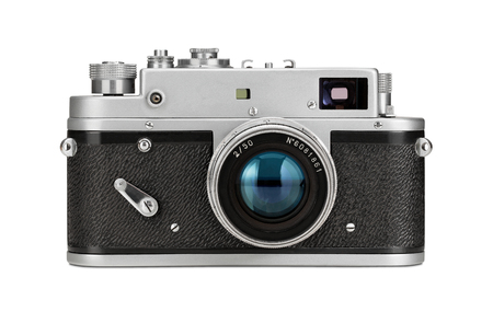 Close up of an old, vintage film camera isolated on white backgroundの写真素材