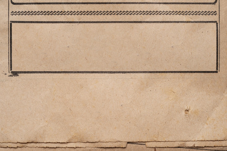 Close up of blank ad frame in old newspapper with copy spaceの写真素材