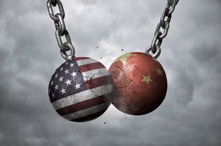 Two wrecking balls with american and chinese flags hitting each other, trade war conceptの写真素材