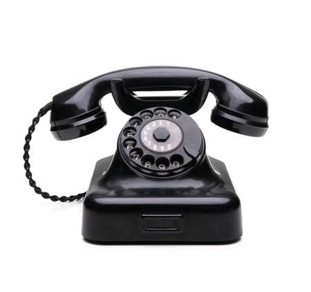 Old scratched telephone isolated on white backgroundの写真素材