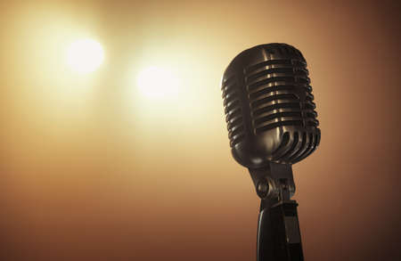 Close up of a retro microphone at the stage with copy spaceの写真素材