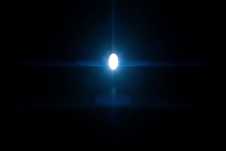 Anamorphic lens flare isolated on black backgroundの写真素材