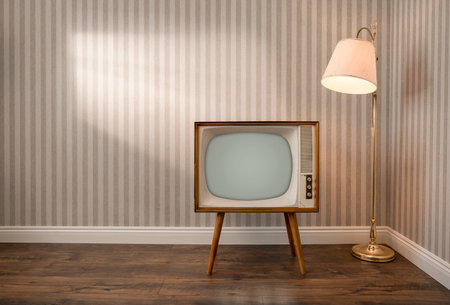 Retro TV set in an empty room with copy spaceの写真素材