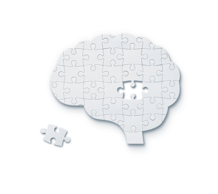 Jigsaw puzzle in shape of human brain isolated on white backgroundの写真素材