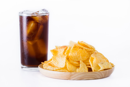 Fried potato chips isolated on white background.の写真素材