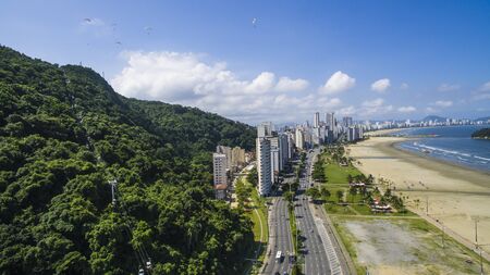 Beautiful beach in South America, Brazil, paragliding in mountainの写真素材