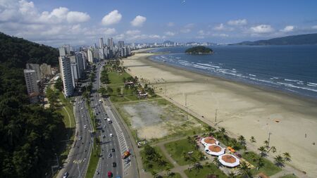 St. Vincent Brazil Beautiful beach in South America, Brazil, paragliding on the mountainの写真素材