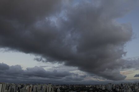 Clouds heavy with rain waterの写真素材
