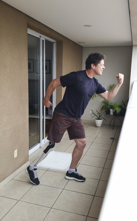 Shorts man chess showing his prosthesis happy lifeの写真素材