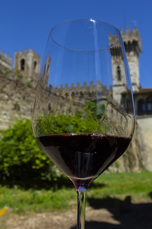 Wine with romance. Wine and castle. Castles of Tuscany wine region of Chianti, Italy. Monastery located in the hills of one Badia Passignano, Tuscany Italy.のeditorial素材