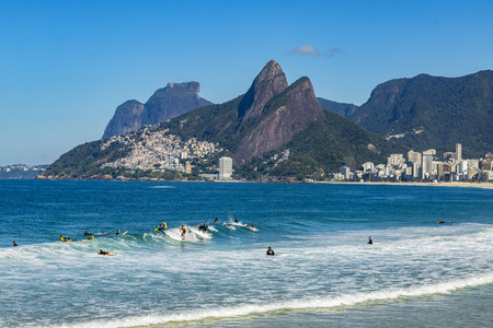 Rio de Janeiro city / Brazil South America - 08/29/2018: Surfers waiting for the perfect wave....