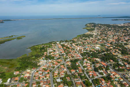 Cities near the sea and lagoon. The city of MaricÃ¡, State of Rio de Janeiro, Brazil.の写真素材