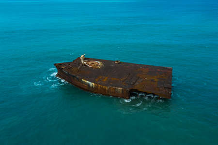 Abandoned ship. Ocean pollution. Fortaleza city, State of CearÃ¡, Brazil.