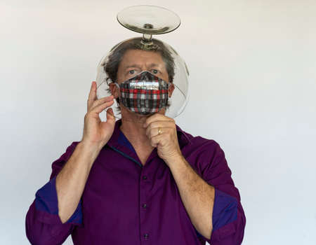 Safety glasses and a medical mask. Security and protection during the COVID-19 epidemic theme.の写真素材