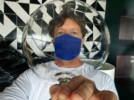 Safety glasses and a medical mask. Security and protection during the COVID-19 epidemic theme.
