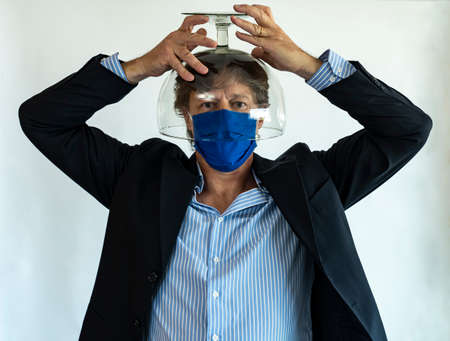 Safety glasses and a medical mask. Security and protection during the COVID-19 epidemic theme.の写真素材